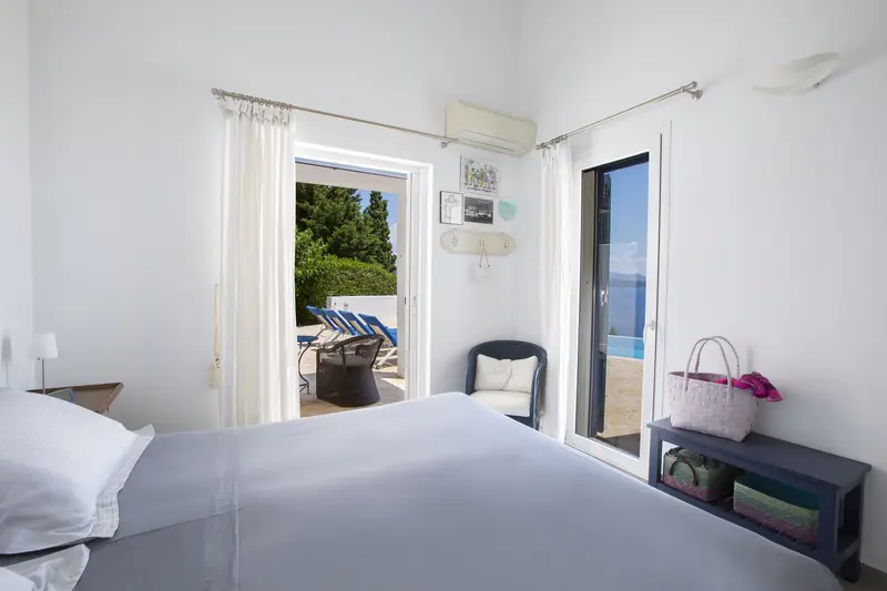 Ground floor bedroom opening directly onto the pool terrace
